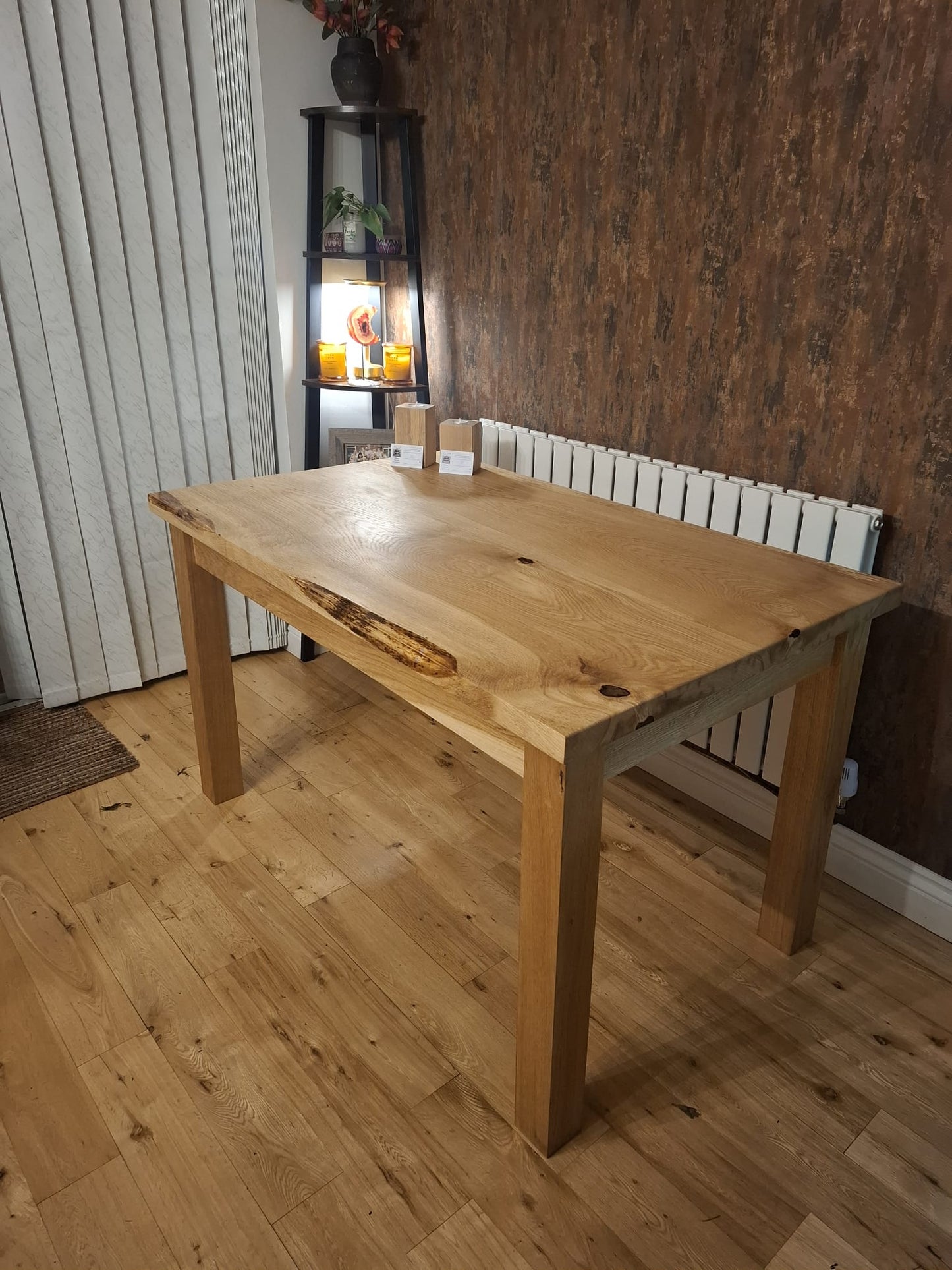 Solid oak table with a drop of resin